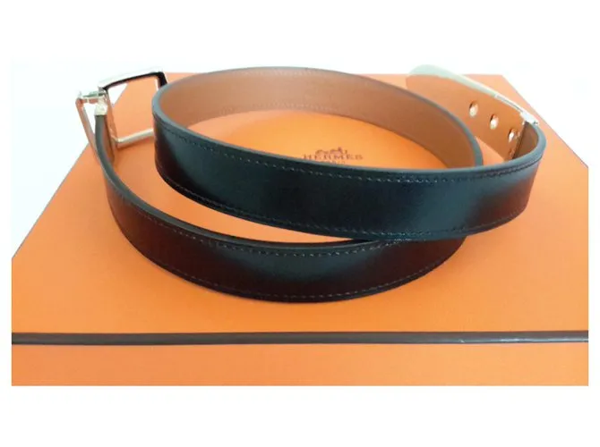 Hermès Caja marrón oscuro y metal dorado 