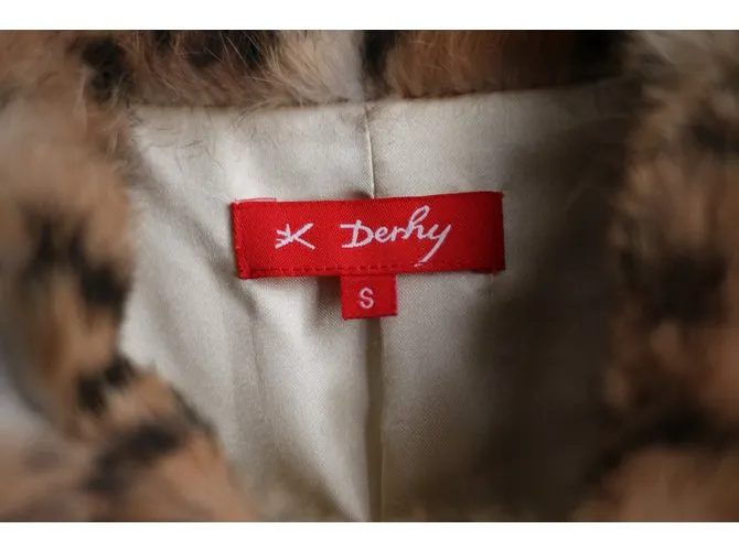 Rene Derhy Capa 
